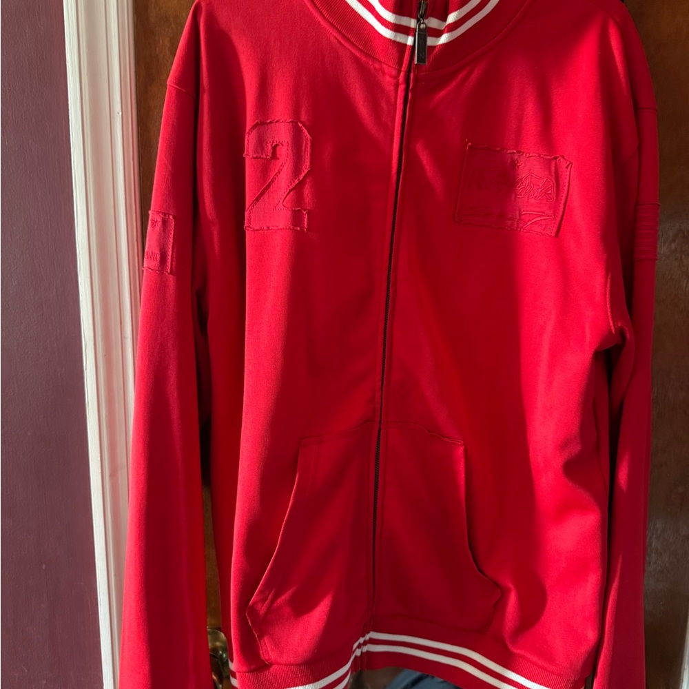 Red Zip-Up Jacket with Striped Collar